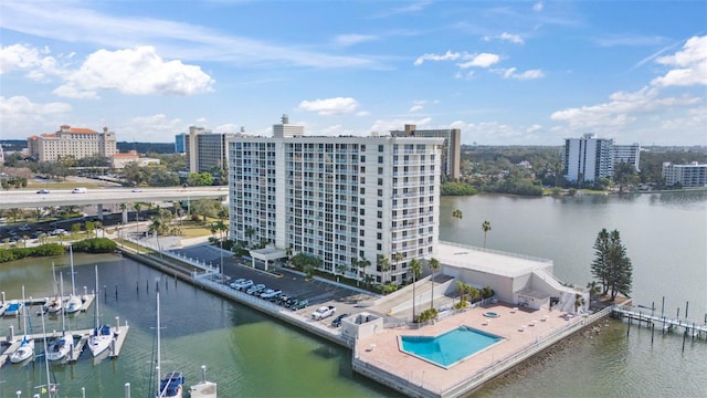 birds eye view of property with a water view