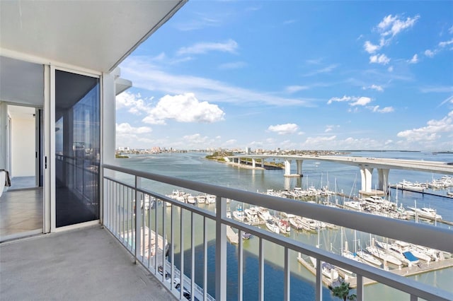 balcony featuring a water view