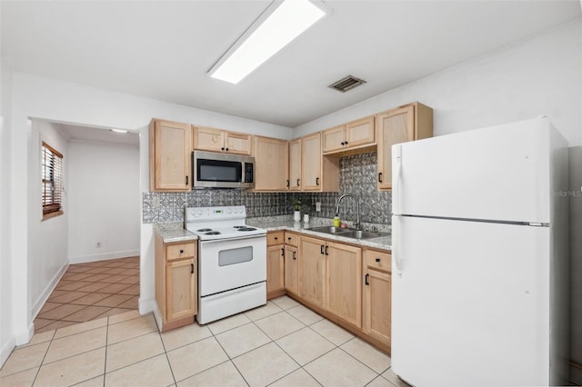 kitchen with sink, backsplash, white appliances, light brown cabinetry, and light tile patterned floors