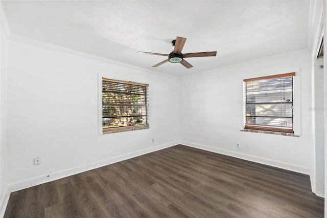 spare room featuring dark hardwood / wood-style floors, ceiling fan, and ornamental molding