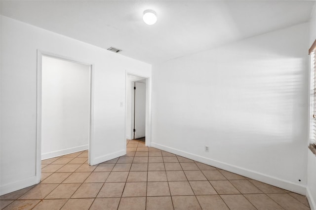 view of tiled spare room