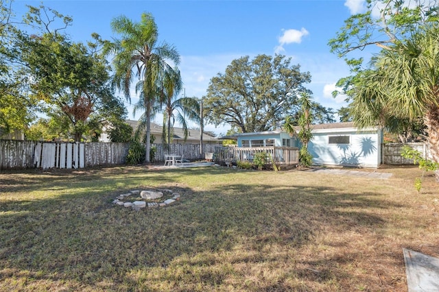 view of yard featuring a wooden deck