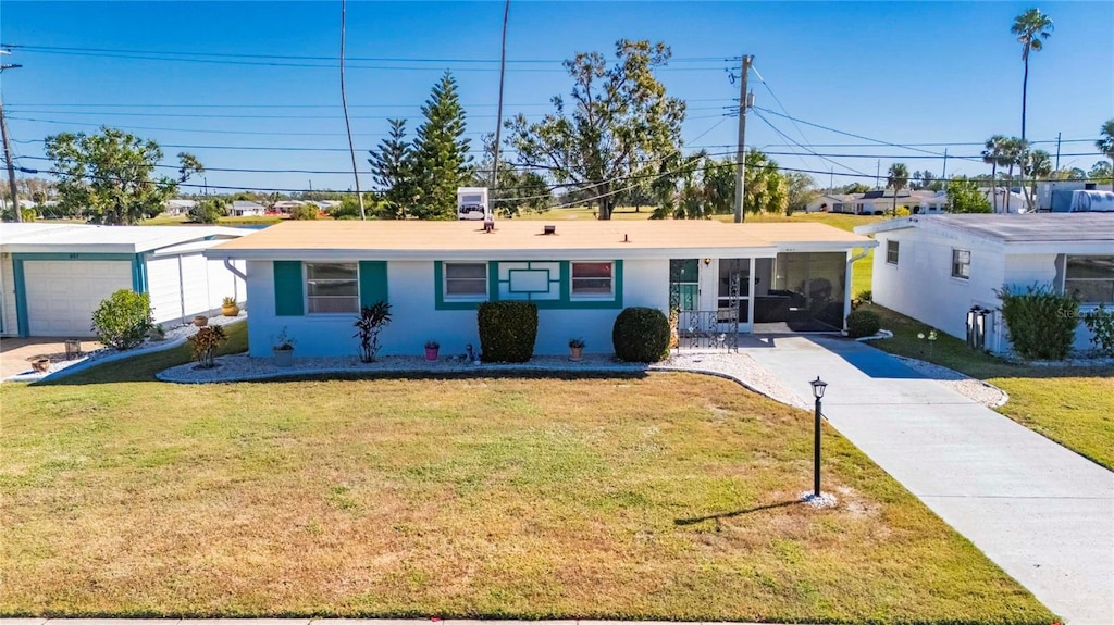 ranch-style house with a front yard