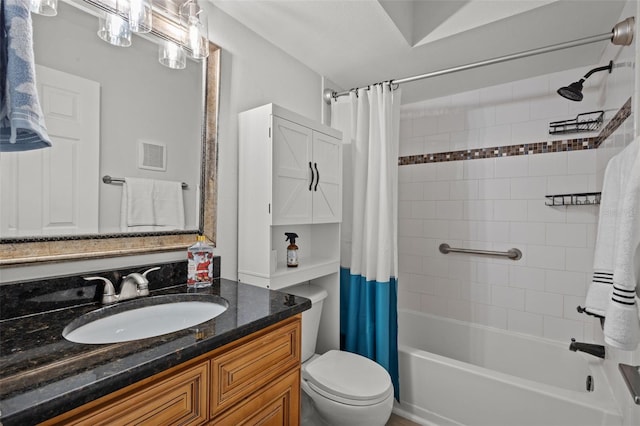 full bathroom featuring shower / tub combo, vanity, and toilet