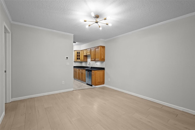 kitchen featuring dishwasher, ornamental molding, a textured ceiling, light hardwood / wood-style floors, and a chandelier