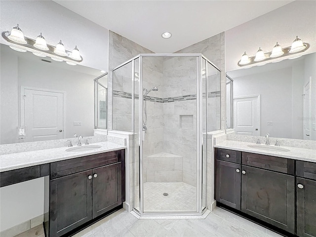 bathroom featuring vanity and walk in shower