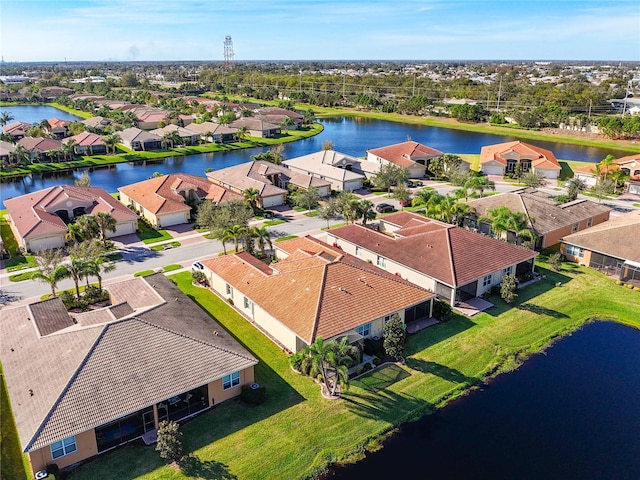 drone / aerial view with a water view