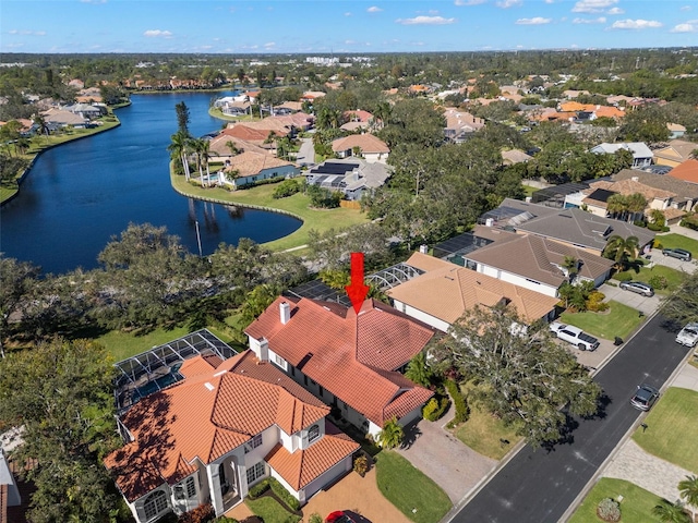 drone / aerial view with a water view