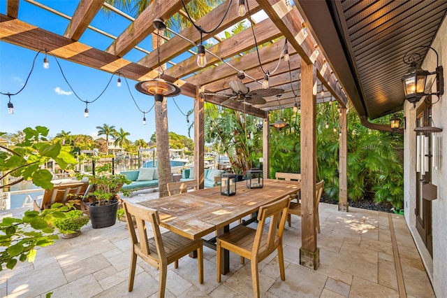 view of patio featuring a pergola and ceiling fan