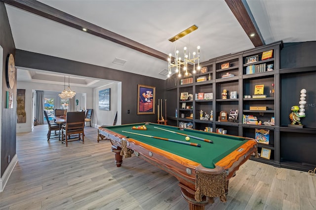 game room featuring a chandelier, hardwood / wood-style floors, beam ceiling, and billiards