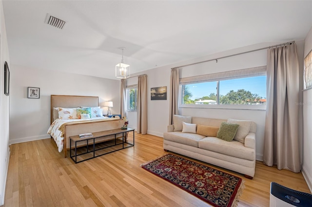 bedroom featuring light hardwood / wood-style floors