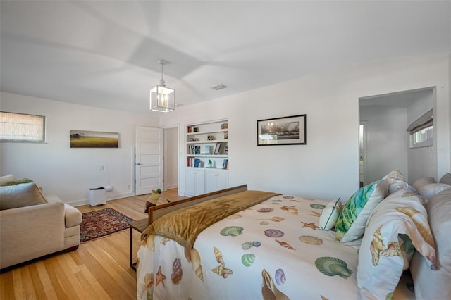 bedroom featuring hardwood / wood-style flooring