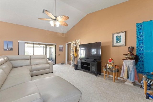 living room featuring ceiling fan, lofted ceiling, and light carpet