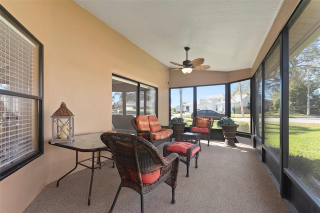 sunroom with ceiling fan