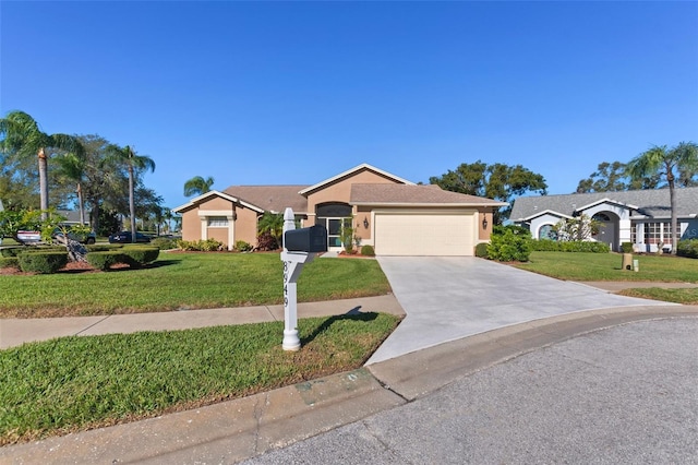 ranch-style home with a front lawn and a garage