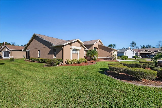 view of home's exterior featuring a lawn