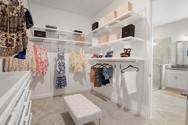 spacious closet with light tile patterned flooring