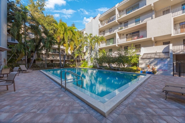 view of pool featuring a patio