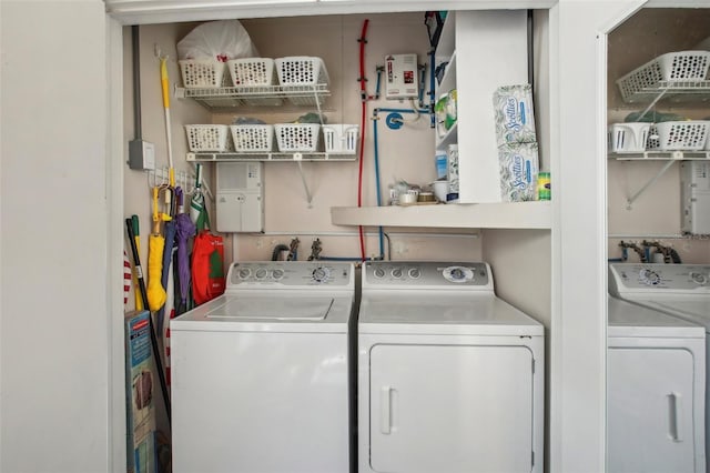 laundry area with separate washer and dryer