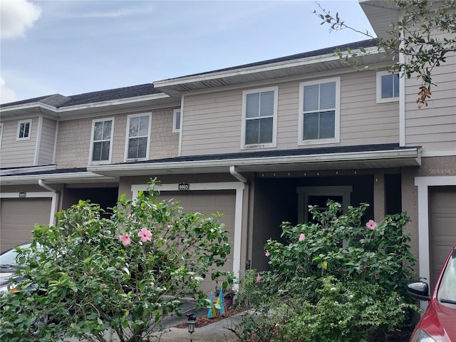 view of front of home with a garage