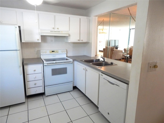 kitchen featuring white cabinets, white appliances, light tile patterned flooring, and sink