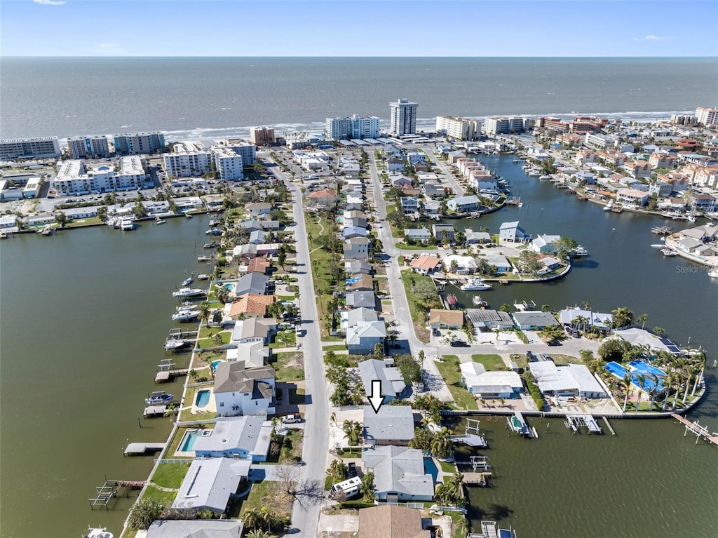 drone / aerial view with a water view