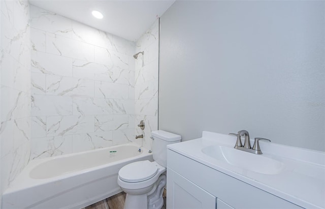 full bathroom with  shower combination, vanity, toilet, and wood finished floors