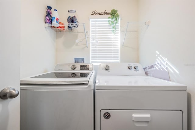 washroom featuring separate washer and dryer