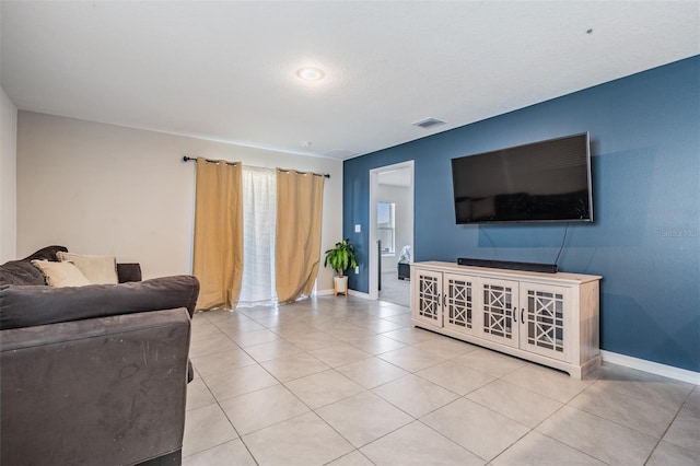 living room featuring light tile patterned floors