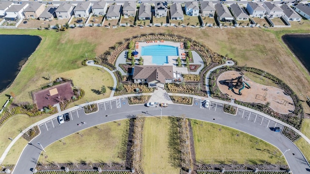 16838 Delia St, Wimauma, FL 33598 - aerial view of property and surrounding area featuring a nearby body of water and nearby suburban area
