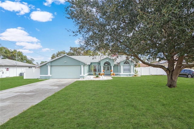 ranch-style home with a front yard, a garage, and central AC unit