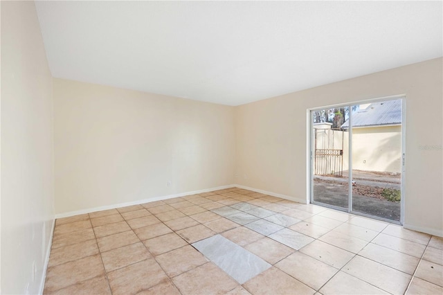 empty room with light tile patterned flooring