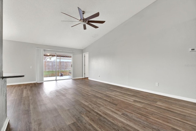 unfurnished living room featuring dark hardwood / wood-style flooring, high vaulted ceiling, and ceiling fan