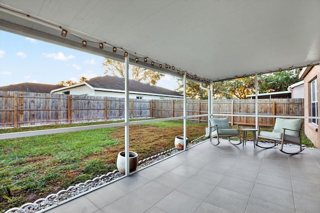 12612 Midpointe Dr, Riverview, FL 33579 - unfurnished sunroom featuring rail lighting