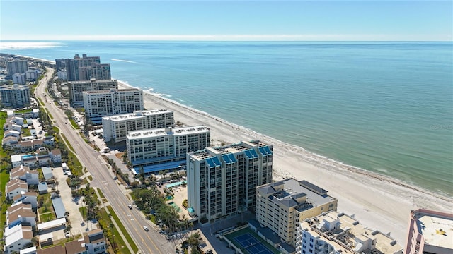 birds eye view of property featuring a water view and a view of the beach