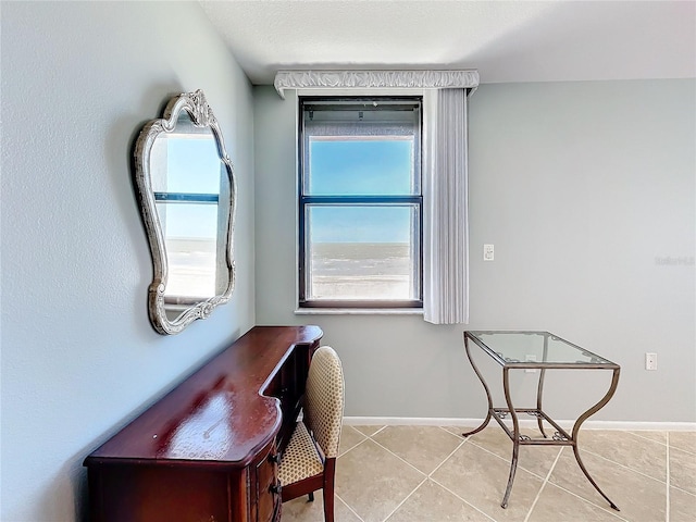 interior space featuring light tile patterned floors