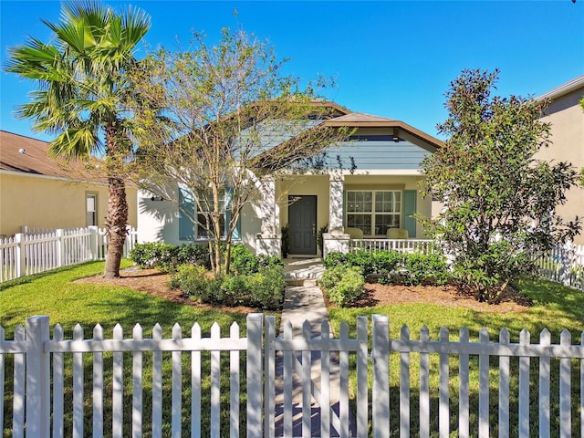 view of front of house featuring a porch and a front yard