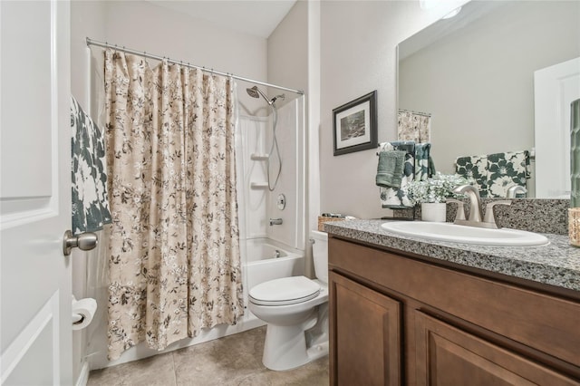 full bathroom featuring tile patterned floors, vanity, toilet, and shower / bath combo with shower curtain