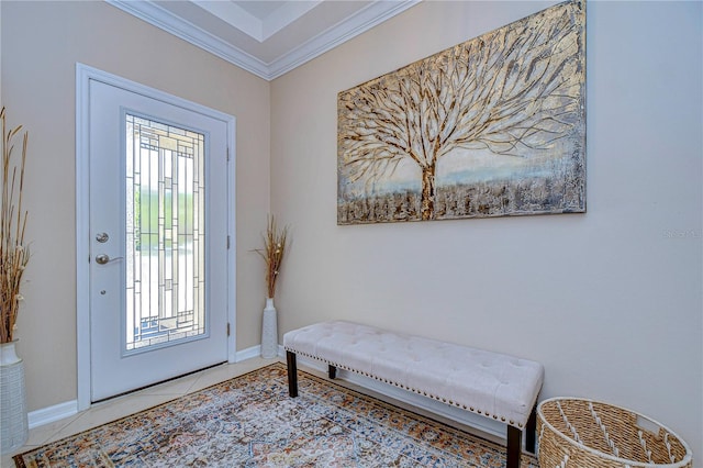 entryway with light tile patterned floors and crown molding