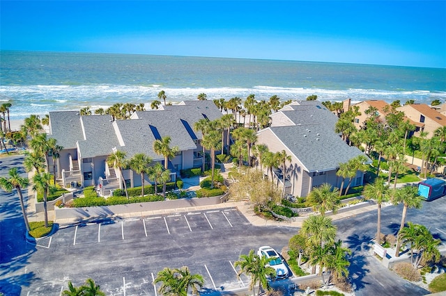 birds eye view of property with a residential view and a water view