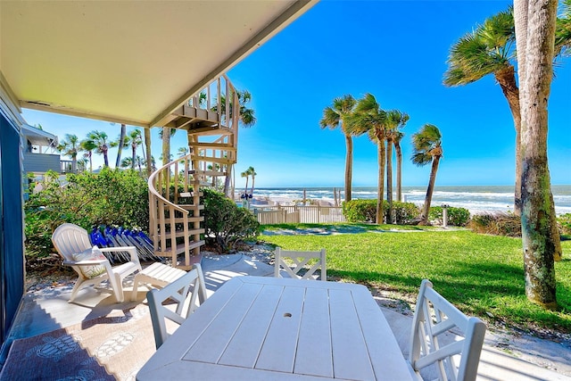 view of patio featuring a water view