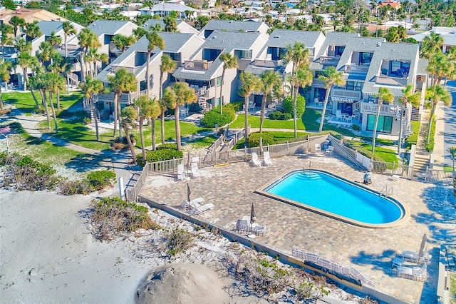 birds eye view of property with a residential view