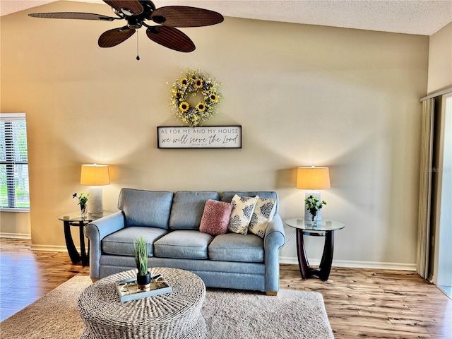 4452 Weybridge St Unit 74, Sarasota, FL 34235 - living area with wood finished floors and a ceiling fan