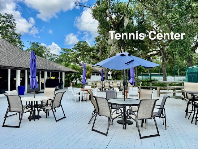 4452 Weybridge St Unit 74, Sarasota, FL 34235 - deck with outdoor dining area