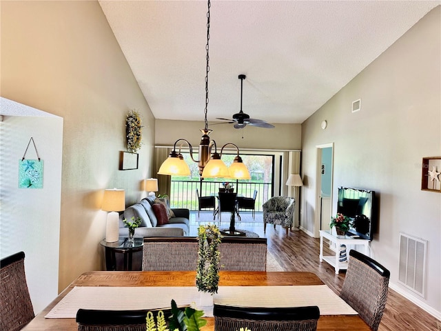 4452 Weybridge St Unit 74, Sarasota, FL 34235 - living room featuring wood finished floors, a ceiling fan, and high vaulted ceiling
