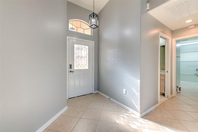 entrance foyer with light tile patterned floors