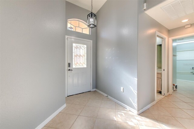 3125 Bent Creek Dr, Valrico, FL 33596 - entrance foyer featuring baseboards, light tile patterned floors, and a high ceiling