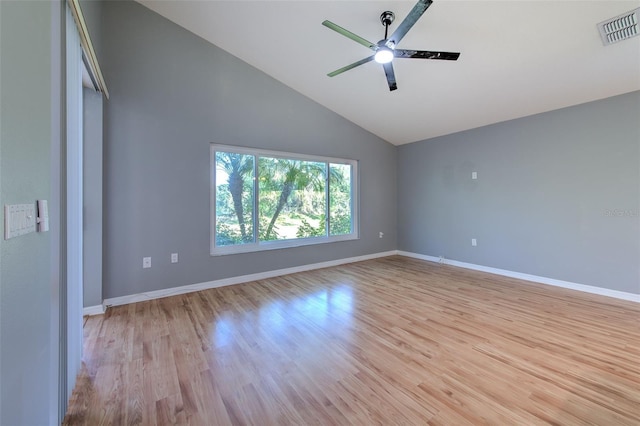 unfurnished bedroom featuring ceiling fan, light hardwood / wood-style flooring, and high vaulted ceiling