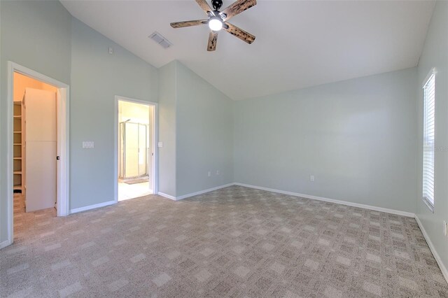 3125 Bent Creek Dr, Valrico, FL 33596 - unfurnished bedroom featuring carpet flooring, a walk in closet, baseboards, high vaulted ceiling, and a ceiling fan