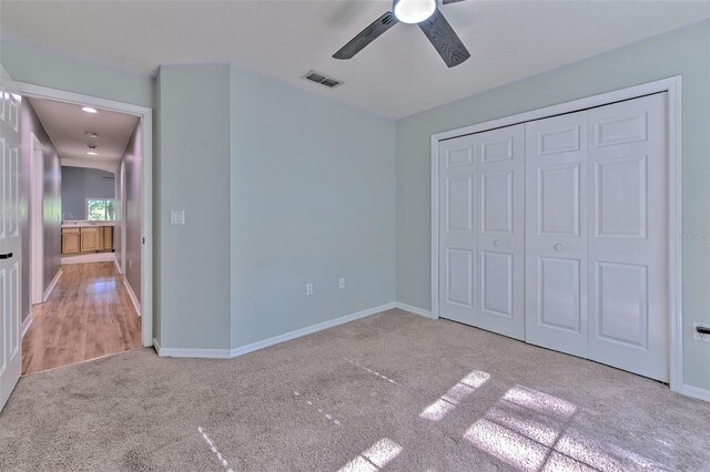 3125 Bent Creek Dr, Valrico, FL 33596 - unfurnished bedroom with carpet floors, baseboards, a closet, and a ceiling fan